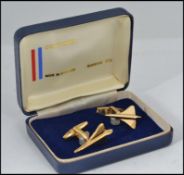 A pair of gold plated gentleman's suit cufflinks in the form of Concorde,