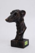 A good cast iron bust of a greyhound racing dogs head. Squared base. Detail to face.