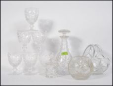 A large collection of crystal glass wares a majority of which is Stuart and also to include several