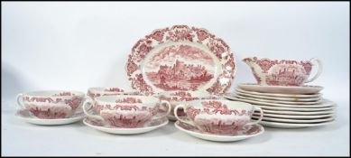 A 20th century transfer printed part dinner service by Enoch Wedgwood ' Royal Homes of Britain '