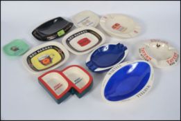 A good collection of vintage and retro advertising pub ashtrays, to include Martell, Harp,