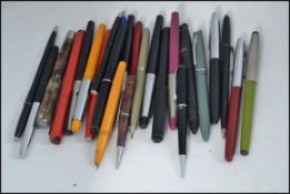 An old writing box containing a collection of Platinum and other vintage fountain pens and