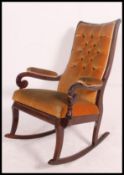 A Regency mahogany rocking chair - armchair.