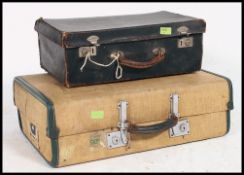 2 vintage 20th century suitcases to include one being a vanity lined sectional case.