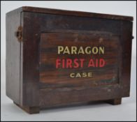 A vintage mid 20th century First Aid box by Paragon, with notation to the hinged lid,