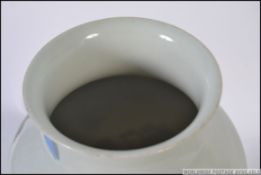 A Chinese large famille rose vase with unusual court scenes of people and storks / cranes.