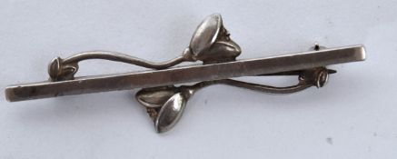 A Georg Jensen silver Danish ladies pin brooch in the form of a bar with flowers. Marked to verso.