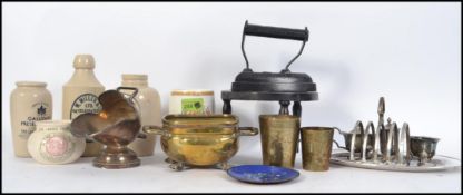 A collection of items to include advertising pots such as R.W.