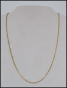 An Italian 18ct gold chain necklace with birdcage style links. Markeed 750 1AR Tests 18ct gold.