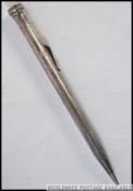 A vintage Eversharp propelling pencil together with a collection of fountain pen nibs,