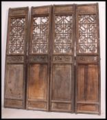 A set of 4 early 20th century / possibly 19th century Chinese doors / panels.