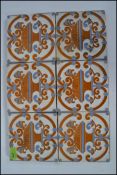 A set of six 19th century Victorian ceramix Maw & Co floret glazed wall tiles.