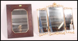 A mid 20th century triptych Louis style mirror along with a Victorian oak framed bevel mirror with