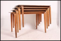 A set of retro 20th century childrens stacking school tables,