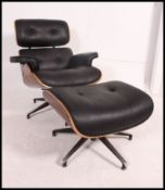 A stunning leather and panelwood armchair and ottomann the manner of Charles Eames ( model no 761 ).