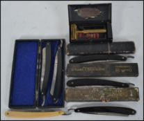 A collection of cut throat razors,
