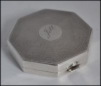 A silver hallmarked compact, with Birmingham Assay marks,
