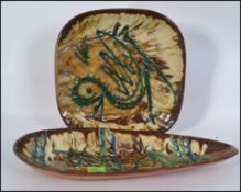 2 1970's Studio pottery bowls / dishes having abstract glazed finish being signed to the base,