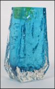 A mid century Whitefriars coffin vase in turquoise blue being designed by Geoffrey Baxter,