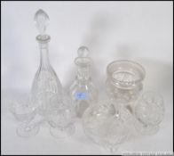 2 cut glass crystal decanters complete with the stoppers ( see illustrations )
