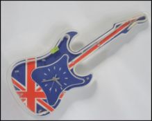 A retro style Brittania / Union flag neon clock in the shape of a guitar,