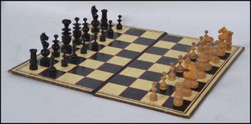 A mid 20th century machine turned treen chess set along with other vintage /retro games
