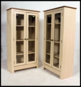A pair of 20th century matching shabby chic display cabinets,