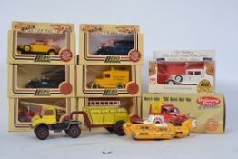 A Corgi yellow submarine together with a Corgi Unimog 406 with trailer, boxed Lledo x6,