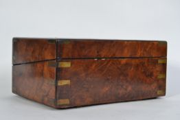 A 19th century brass-bound writing slope box with spring-loaded secret compartment,
