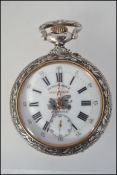 A beautiful large silver plated open faced pocket watch with répoussé case signed ' Frainier ' The