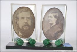 A vintage curio photograph frame set.