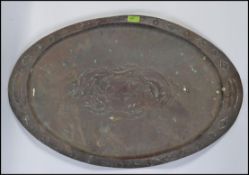 A stunning 19th century hand beaten Newlyn style Cornish copper charger.