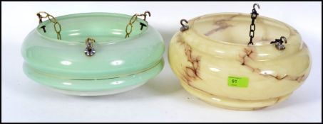 Two 1930's Art Deco glass ceiling light shades, one having a mottled finish ,