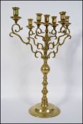 A large 20th century brass candelabra,