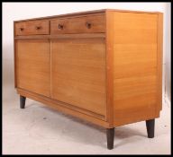 A 1960's Gordon Russell oak and rosewood sideboard.