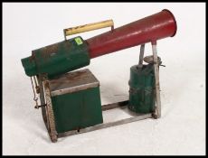 A vintage mid 20th century Zone Industrial Bird Scarer No 2 having angular horn and shaped base in