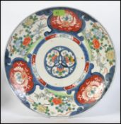 A 19th century large Chinese Imari wall charger.