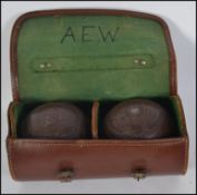 A vintage Jaquelite set of 2 lawn crown green bowling bowls measure bag bundle complete with the