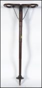 A stunning early 20th century oak shooting stick by W S Moore and Grey L76cm.