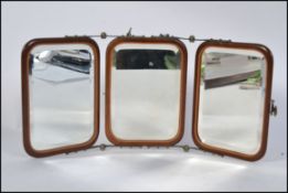 A very good quality gentlemans mahogany barbers mirror having metal clasps with 3 bevelled glass