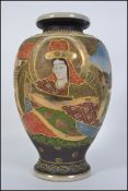 A 20th century Japanese Satsuma vase of baluster form with decorative all over patterns and scenes.