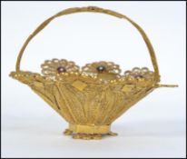 A vintage beautiful 20th century miniature filigree worked yellow metal bon bon dish adorned with