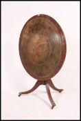 A good quality Regency style mahogany and leather tilt top library - reading table.