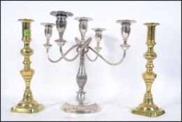A silver plate 5 branch candelabra together with 2 early 20th century large heavy brass