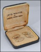 A pair of 9ct gold gentlemans cufflinks complete in the case.
