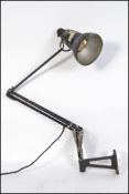A vintage industrial workers wall mountable Herbert Terry anglepoise lamp,