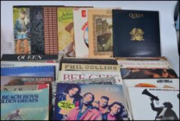A Collection of vinyl long play records to include Abba, Cher, Elvis, Gilbert O'Sullivan, Queen,