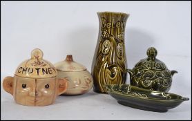 A set of 5 retro vintage face pots comprising Mint,