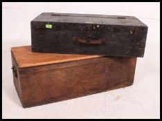 A vintage ebonised pine tool box (with later lid) along with a vintage travel trunk,