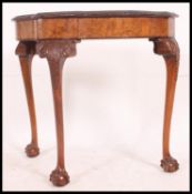 A good quality walnut demi lune console hall table raised on cabriole legs with claw and ball feet